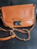 Picture of IZZY AND ALI Orange Patent Crossbody Bag - Stylish and Versatile