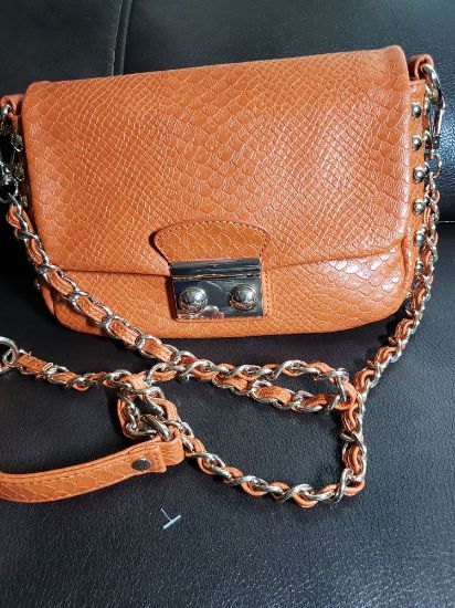 Picture of IZZY AND ALI Orange Patent Crossbody Bag - Stylish and Versatile