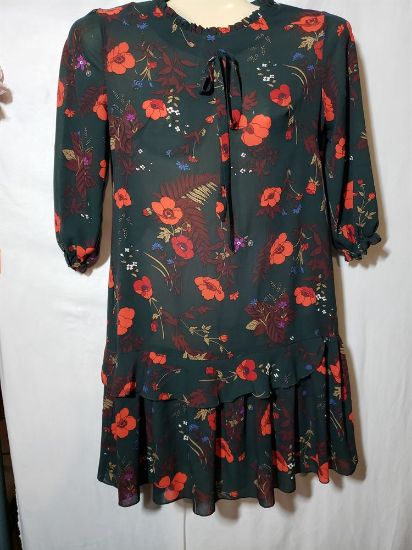 Picture of Vibrant Green and Red Flowery Top - Perfect for Any Occasion